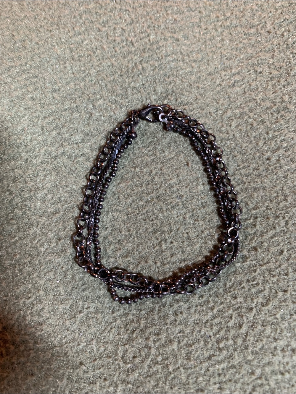 EUC cute black, metal, 3 strand bracelet. 7 1/2”.